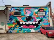 Greg Mike<br/>2015 - 2018<br/><span style= "font-size: 6pt">33.754420801146495, -84.36429889923218</span> Street Art Mural formerly in Inman Park Atlanta by Greg Mike Featuring Larry Loudmouf with two windows for eyes