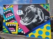 Greg Mike<br/>2017 - 2022<br/><span style= "font-size: 6pt">33.774343172727434, -84.38982240083841</span> Street Art Mural formerly in Midtown Atlanta by Greg Mike featuring a roaring tiger and Larry Loudmouf