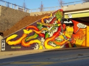 Rising Red Lotus (Brandon Sadler)<br/>2016 - 2021<br/><span style= "font-size: 6pt">33.77116265077004,-84.36410419642925</span> Street Art Mural formerly in Old Fourth Ward Atlanta by Rising Red Lotus (Brandon Sadler) featuring a Native American