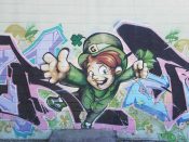 Artist ?<br/>2010 - 2019<br/><span style= "font-size: 6pt">33.75308160360758, -84.37151905289079</span> Detail of a Graffiti Piece Formerly in Old Fourth Ward Atlanta featuring a leprechaun