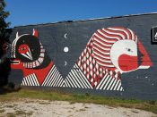 Fefe Talavera<br/>2012 - 2022<br/><span style= "font-size: 6pt">33.73911500205799, -84.3444563029334</span> Street Art Mural formerly in East Atlanta Village by Fefe Talavera featuring two red and black creatures