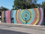 Hoxxoh<br/>2015 - 2018<br/><span style= "font-size: 6pt">33.74036078441566, -84.34682709350598</span> Street Art Mural formerly in East Atlanta by Hoxxoh featuring a circular pattern