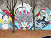 Sanithna Phansavanh & Tanner Wilson<br/>2015 - 2020<br/><span style= "font-size: 6pt">33.751002513127546, -84.36766119562715</span> Street Art Mural formerly in Cabbagetown Atlanta by Sanithna Phansavanh and Tanner Wilson featuring a face, a bird, and a reclining woman