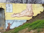 Santiago Menendez-Gil<br/>2013 - 2019<br/><span style= "font-size: 6pt">33.738940525902244, -84.43293193051093</span> Detail of a larger Street Art Mural formerly on the BeltLine in West End Atlanta by Santiago Menendez-Gil featuring a foot about to step on a mouse