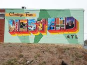 Victor Ving<br/>? - 2022<br/><span style= "font-size: 6pt">33.73127212502275, -84.4206790706115</span> Street Art Mural formerly in West End Atlanta by Victor Ving featuring the text "greetings from West End ATL"