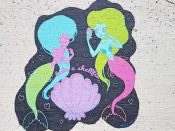 Kate Logan<br/>2017 - 2024<br/><span style= "font-size: 6pt">33.734582627404905, -84.3490493096161</span> Street Art Mural formerly in East Atlanta by Kate Logan featuring two mermaids