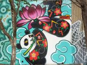 Wes Holland<br/>2018 - 2022<br/><span style= "font-size: 6pt">33.75184017481867, -84.36499762274514</span> Forward Warrior Mural formerly in Cabbagetown Atlanta by Wes Holland featuring a panda and a lotus flower