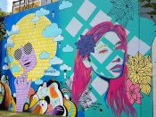 Lela Brunet, Janice Rago, Phil Harris<br/>2018 - 2019<br/><span style= "font-size: 6pt">33.752329062821914, -84.36301684015909</span> Forward Warrior Mural formerly in Cabbagetown Atlanta by Lela Brunett, Janice Rago, and Phil Harris featuring a woman with yellow hair and a woman with red hair, and an abstract pattern