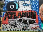 FRKO<br/>2018 - 2019<br/><span style= "font-size: 6pt">33.752424239622584, -84.3627015040135</span> Forward Warrior Mural formerly in Cabbagetown Atlanta by FRKO featuring an 8 ball and a car