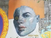 Erin Nicole Henry<br/>2018 - 2021<br/><span style= "font-size: 6pt">33.752065, -84.363979</span> Forward Warrior Mural formerly in Cabbagetown Atlanta by Erin Nicole Henry featuring a face