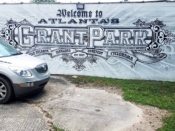 The Loss Prevention<br/>2012 - 2019<br/><span style= "font-size: 6pt">33.74239268092903, -84.36684330806294</span> Street Art Mural that no longer exists by The Loss Prevention featuring the text Welcome to Grant Park