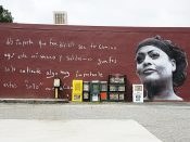 Jetsonorama<br/>2017 - 2022<br/><span style= "font-size: 6pt">33.83703608940714,-84.3347554653883</span> Street Art Mural formerly on Buford Highway in Atlanta by Jetsonorama featuring a face and text