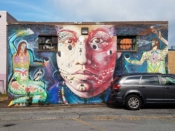 Gaia, Nanook, Doodles<br/>2012? - 2019<br/><span style= "font-size: 6pt">33.77220975111386, -84.29425191304868</span> Street Art Mural formerly in Decatur, Georgia by Gaia, Nanook, and Doodles featuring a face and two twins