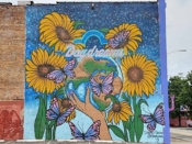 Debbi Snax<br/>2017 - 2019<br/><span style= "font-size: 6pt">33.75070750928427, -84.39635282566502</span> Street Art Mural formerly in Downtown Atlanta by Debbie Snax featuring flowers