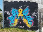 Nels Guzman & @i.am.muna<br/>2017 - 2019<br/><span style= "font-size: 6pt">33.73330250885938, -84.39820188005056</span> Street Art Mural formerly in Mechanicsville Atlanta by Nels Guzman and @i.am.muna featuring a butterfly