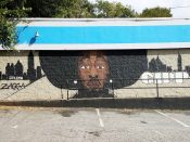 J. Flem<br/>2018 - 2020<br/><span style= "font-size: 6pt">33.77150076922416, -84.37129774257868</span> Street Art Mural formerly in Old Fourth Ward Atlanta by J. Flem featuring a man with an afro