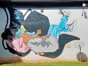 Muhammad Suber<br/>2018 - 2025<br/><span style= "font-size: 6pt">33.73922622255932, -84.41986158569642</span> Street Art Mural in West End Atlanta by Muhammad Suber featuring a top view of a man and a woman