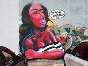 Artist ?<br/>2018? - 2020<br/><span style= "font-size: 6pt">33.735446301684, -84.4088489746069</span> Street Art Mural formerly in Adair Park Atlanta by an unknown artist featuring a woman with her arms crossed