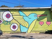 Olive47<br/>2012 - 2021<br/><span style= "font-size: 6pt">33.70550262748216,-84.37905051713665</span> Street Art Mural formerly in Lakewood Heights Atlanta by Olive47 featuring a hummingbird