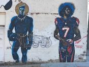 Fabian Williams<br/>2018 - 2019<br/><span style= "font-size: 6pt">33.74895537384576, -84.41764651889777</span> Street Art Mural formerly in Ashview Heights Atlanta by Fabian Williams featuring Muhammad Ali & Colin Kaepernick