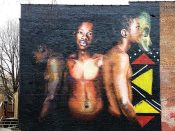 Ernest Shaw<br/>2019 - 2021<br/><span style= "font-size: 6pt">33.75089194270012, -84.39634495061273</span> Street Art Mural formerly in Downtown Atlanta by Ernest Shaw featuring three kids and a mask