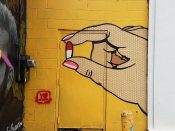 Chris Veal<br/>2018 - 2019<br/><span style= "font-size: 6pt">33.76675519633231, -84.34892325666291</span> Street Art Mural formerly in Little Five Points Atlanta by Chris Veal featuring a hand holding a valium capsule