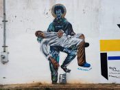 Fabian Williams<br/>2018 - 2025<br/><span style= "font-size: 6pt">33.70689174220178, -84.37959330093825</span> Street Art Mural formerly in Lakewood Heights Atlanta by Fabian Williams featuring a person holding another person