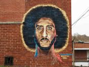 Fabian Williams<br/>2019 - 2022<br/><span style= "font-size: 6pt">33.76586991641097, -84.40484216249153</span> Street Art Mural formerly in West Atlanta by Fabian Williams featuring an image of Colin Kaepernick