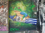 Nels Guzman<br/>2019 - 2020<br/><span style= "font-size: 6pt">33.7667800288228, -84.34893993402038</span> Street Art Mural formerly in Little Five Points Atlanta by Nels Guzman featuring a frog