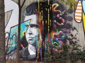 Ian Wilkinson<br/>2019 - 2025<br/><span style= "font-size: 6pt">33.75179741139917, -84.36518995679047</span> Street Art Mural formerly in Cabbagetown Atlanta by Ian Wilkinson featuring a face and snakes