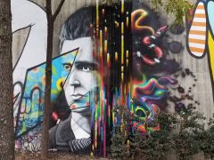 Ian Wilkinson<br/>2019 - 2025<br/><span style= "font-size: 6pt">33.75179741139917, -84.36518995679047</span> Street Art Mural in Cabbagetown Atlanta by Ian Wilkinson featuring a face and snakes