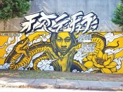 Rising Red Lotus (Brandon Sadler)<br/>2019 - 2023<br/><span style= "font-size: 6pt">33.75168759525418,-84.36598777770996</span> Street Art Mural formerly in Cabbagetown Atlanta by Rising Red Lotus (Brandon Sadler) featuring a face and a snake