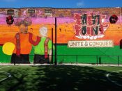 Artist ?<br/>2019? - 2024<br/><span style= "font-size: 6pt">33.67907981396057, -84.44062410263533</span> Street Art Mural formerly in East Point, Georgia by an unknown artist featuring the words "unite and conquer"