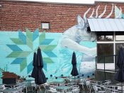 Marcy Starz<br/>2014 - 2022<br/><span style= "font-size: 6pt">33.73667229376329,-84.38538610582799</span> Street Art Mural formerly in Summerhill Atlanta by Marcy Starz featuring a woman with a deer's head