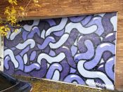 Travis Love<br/>2019 - 2021<br/><span style= "font-size: 6pt">33.754601782195046, -84.41496872733094</span> Street Art Mural formerly in Vine City Atlanta by Travis Love featuring a purple squiggle pattern