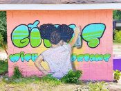 Yuzly Mathurin<br/>2020 - 2021<br/><span style= "font-size: 6pt">33.73708607890317, -84.35905889497309</span> Street Art Mural formerly on the Atlanta BeltLine in Grant Park by Yuzly Mathurin featuring a girl painting and the text "girls with dreams..."