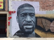 Dustin Emory<br/>2020 - 2021<br/><span style= "font-size: 6pt">33.763435296191936, -84.39700099889433</span> Street Art Mural formerly in downtown Atlanta by Dustin Emory featuring a portrait of George Floyd