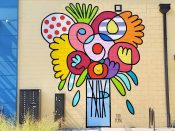 Yoyo Ferro<br/>2020 - 2025<br/><span style= "font-size: 6pt">33.72533047301855, -84.37750141614825</span> Street Art Mural formerly in Grant Park Atlanta by Yoyo Ferro featuring flowers in a vase of water