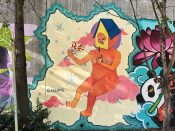 Melanie Paulos<br/>2020 - 2022<br/><span style= "font-size: 6pt">33.751860680827946, -84.3650583614804</span> Street Art Mural formerly in Cabbagetown Atlanta by Melanie Paulos featuring a woman with a bird house over her head