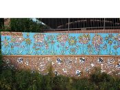 King Pig (Dan Hagerty)<br/>? - 2018<br/><span style= "font-size: 6pt">33.774309, -84.364646</span> Street Art Mural formerly on the Atlanta BeltLine in Midtown Atlanta by King Pig (Dan Hagerty) featuring flowers with faces