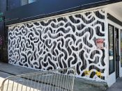 Travis Love<br/>2021 - 2021<br/><span style= "font-size: 6pt">33.76462258436748,-84.35002471137744</span> Street Art Mural formerly in Little Five Points Atlanta by Travis Love featuring a black and white pattern