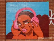 Drew Borders<br/>2021 - 2021<br/><span style= "font-size: 6pt">33.7320280918878, -84.42284637463564</span> Street Art Mural formerly on the BeltLine in West End Atlanta by Drew Borders featuring a woman wearing headphones