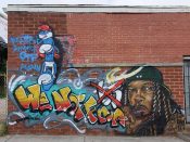 @young_gunz555<br/>2021 - 2022<br/><span style= "font-size: 6pt">33.765777642943256, -84.40480972834949</span> Street Art Mural formerly in English Avenue Atlanta by @young_gunz555 featuring Smurfs and a man with a hat