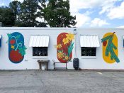 Tes Arlette<br/>2021 - 2024<br/><span style= "font-size: 6pt">33.816182859216056, -84.33545086156448</span> Street Art Mural formerly in Toco Hills Atlanta by Tes Arlette featuring a pumpkin, flower, and pine branch