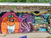 Atomik, Choro, & Task<br/>2021 - 2025<br/><span style= "font-size: 6pt">33.76898530026242, -84.40495605871364</span> Street Art Murals formerly in English Avenue Atlanta by Atomik, Choro, and Task featuring an orange, a peacock, and a frog