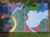 Artsy Elaine (Elaine Stephenson)<br/>2021 - 2023<br/><span style= "font-size: 6pt">33.73200746344138, -84.42034022343653</span> Basketball Court Mural formerly in West End Atlanta by Artsy Elaine featuring a geometric pattern and a rose