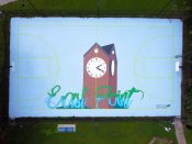 Anthony Smith<br/>2021 - 2024<br/><span style= "font-size: 6pt">33.66860793323378, -84.4724400127697</span> Basketball court mural formerly in East Point Atlanta by Anthony Smith featuring a clock tower