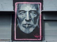Street Art Mural formerly in Reynoldstown Atlanta by Alex Glustrom featuring a man with a beard