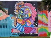 Mario Daniel & Oofster (Pierre Cerrato)<br/>2021 - 2022<br/><span style= "font-size: 6pt">33.752460703167046, -84.36278203801747</span> Street Art Mural formerly in Cabbagetown Atlanta by Mario Daniel & Oofster (Pierre Cerrato) featuring a mash-up character