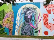 Janice Rago<br/>2021 - 2022<br/><span style= "font-size: 6pt">33.75235484197517, -84.363010191793</span> Street Art Mural formerly in Cabbagetown Atlanta by Janice Rago featuring a woman with flowers on her head